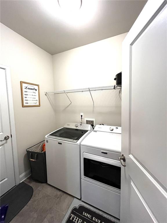 washroom with washer and dryer