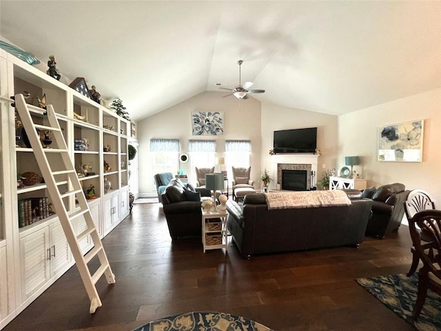 living room featuring ceiling fan, vaulted ceiling, and dark hardwood / wood-style flooring