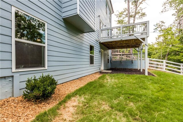 view of yard with a deck