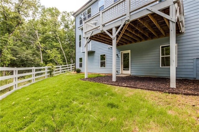 view of yard featuring a wooden deck