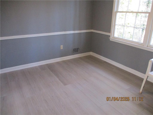 empty room featuring light hardwood / wood-style flooring