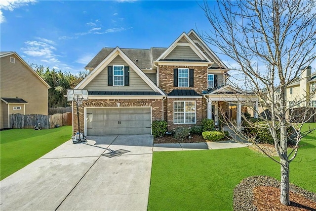 craftsman inspired home with driveway, brick siding, a standing seam roof, fence, and a front yard