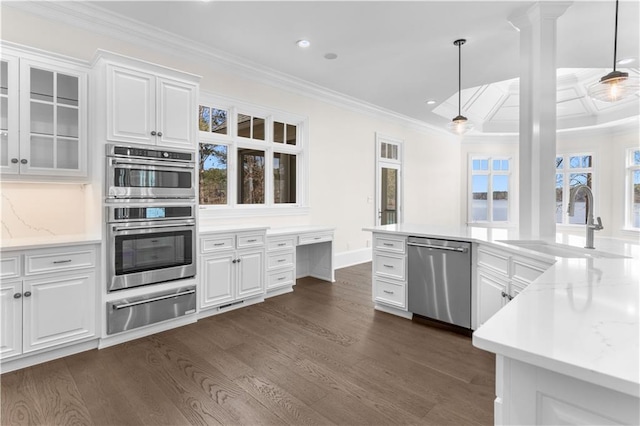 1070 Prosperity Pt, Greensboro, GA 30642 - kitchen with appliances with stainless steel finishes, a warming drawer, a sink, ornamental molding, and dark wood-style flooring