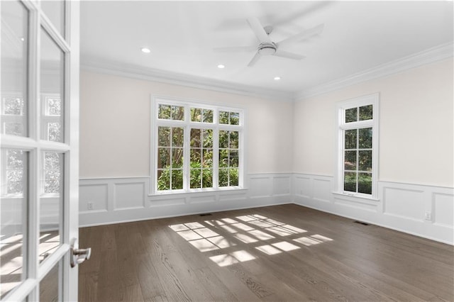 1070 Prosperity Pt, Greensboro, GA 30642 - spare room with crown molding, ceiling fan, dark wood finished floors, wainscoting, and recessed lighting