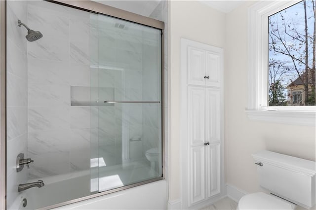 1070 Prosperity Pt, Greensboro, GA 30642 - full bath featuring shower / bath combination with glass door, toilet, and baseboards