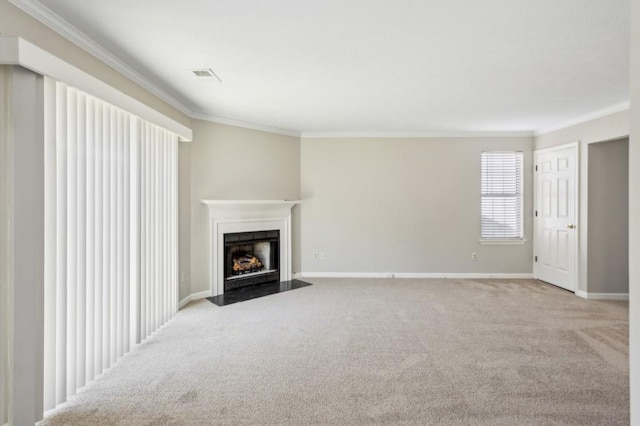 unfurnished living room featuring visible vents, baseboards, a fireplace with flush hearth, ornamental molding, and carpet floors