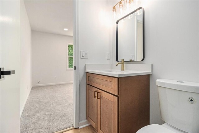657 Stratford Green Way, Avondale Estates, GA 30002 - bathroom featuring vanity, toilet, baseboards, and recessed lighting