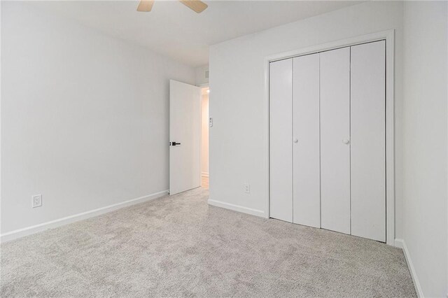657 Stratford Green Way, Avondale Estates, GA 30002 - unfurnished bedroom featuring carpet flooring, baseboards, a closet, and ceiling fan