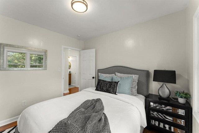 bedroom featuring hardwood / wood-style flooring