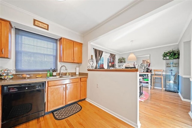 kitchen with black dishwasher, ornamental molding, light wood-style flooring, a peninsula, and a sink