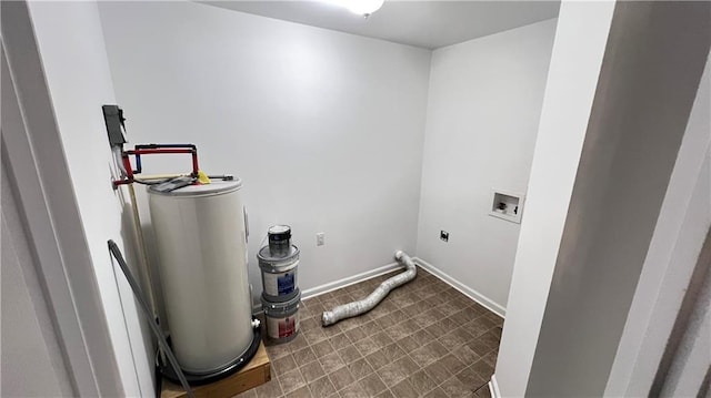 laundry area with washer hookup, gas water heater, hookup for an electric dryer, laundry area, and baseboards