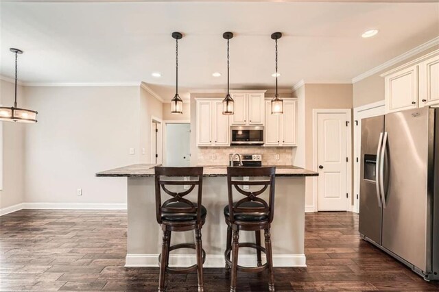 46 Grand Georgian Ct NE, Cartersville, GA 30121 - kitchen featuring stainless steel appliances, dark wood-style flooring, tasteful backsplash, baseboards, and ornamental molding