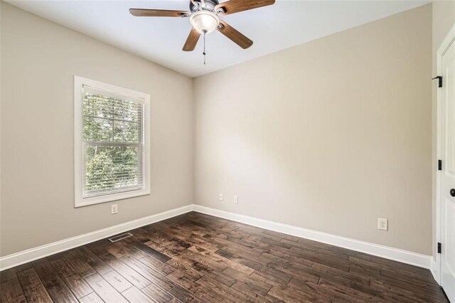 46 Grand Georgian Ct NE, Cartersville, GA 30121 - spare room featuring ceiling fan, baseboards, and dark wood-style flooring