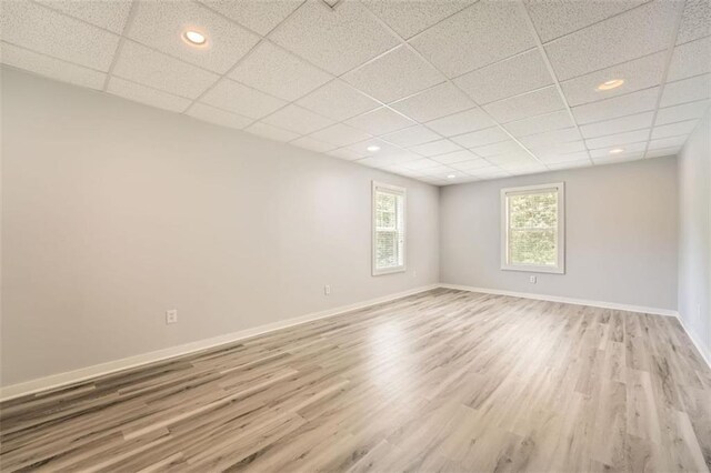 46 Grand Georgian Ct NE, Cartersville, GA 30121 - spare room with light wood finished floors, a drop ceiling, baseboards, and recessed lighting