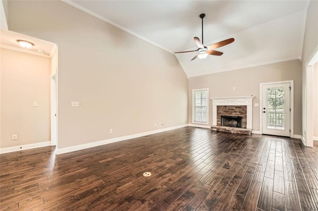 46 Grand Georgian Ct NE, Cartersville, GA 30121 - unfurnished living room featuring ceiling fan, dark wood-style flooring, vaulted ceiling, baseboards, and ornamental molding