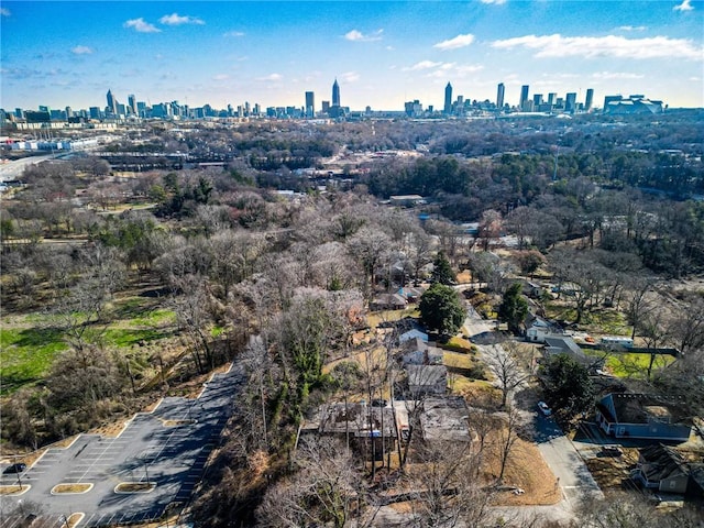 birds eye view of property with a view of city