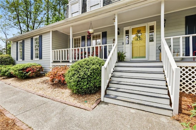 property entrance with a porch