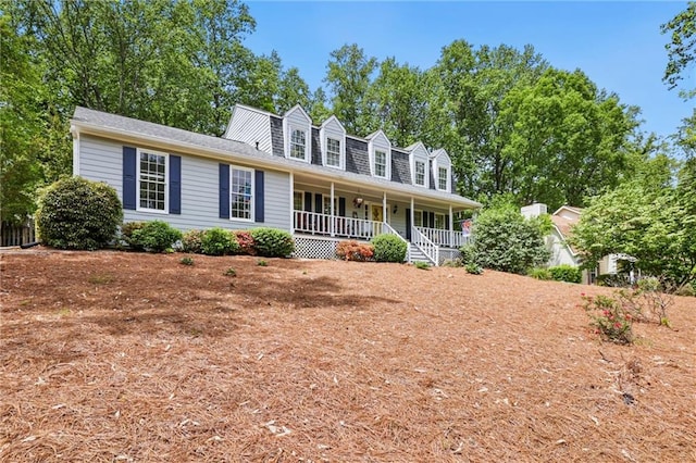cape cod house with covered porch