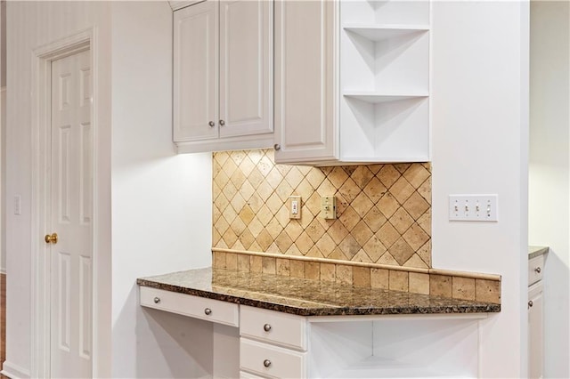 915 Summer Wind Pl, Roswell, GA 30075 - kitchen featuring open shelves, backsplash, white cabinetry, and dark stone counters