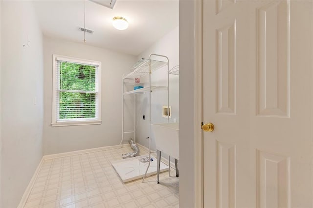 915 Summer Wind Pl, Roswell, GA 30075 - laundry area featuring electric dryer hookup, light floors, and baseboards