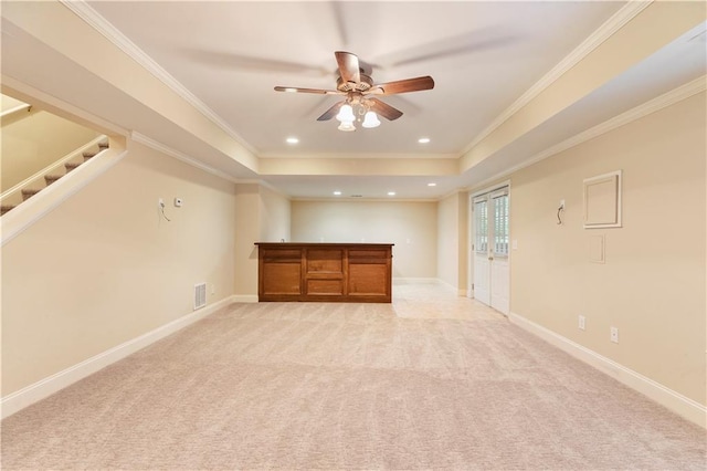 915 Summer Wind Pl, Roswell, GA 30075 - spare room featuring light colored carpet, a ceiling fan, stairway, crown molding, and baseboards