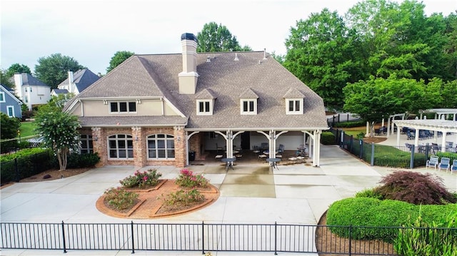915 Summer Wind Pl, Roswell, GA 30075 - rear view of property with a pergola, a chimney, stucco siding, a shingled roof, and a patio area