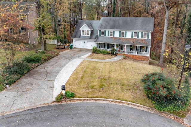 view of front of house with a garage and covered porch