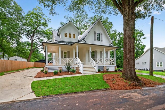 305 Milledge Ave, Monroe, GA 30655 - view of front of house featuring a porch and driveway