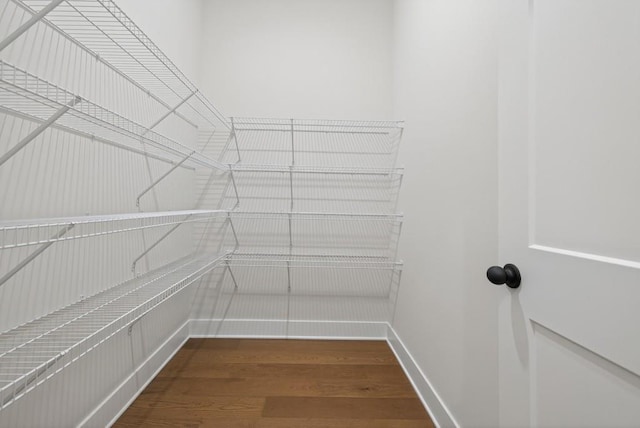 305 Milledge Ave, Monroe, GA 30655 - walk in closet featuring dark wood finished floors