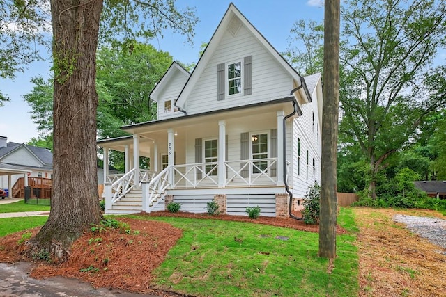 305 Milledge Ave, Monroe, GA 30655 - view of front of property with covered porch and a front lawn
