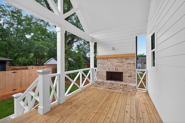 305 Milledge Ave, Monroe, GA 30655 - wooden terrace featuring an outdoor brick fireplace