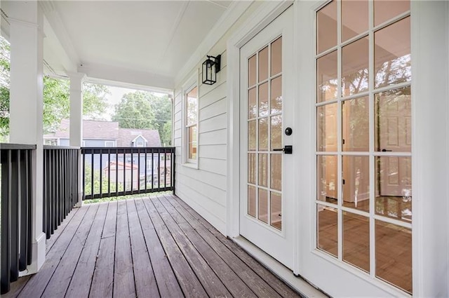 wooden terrace with a porch