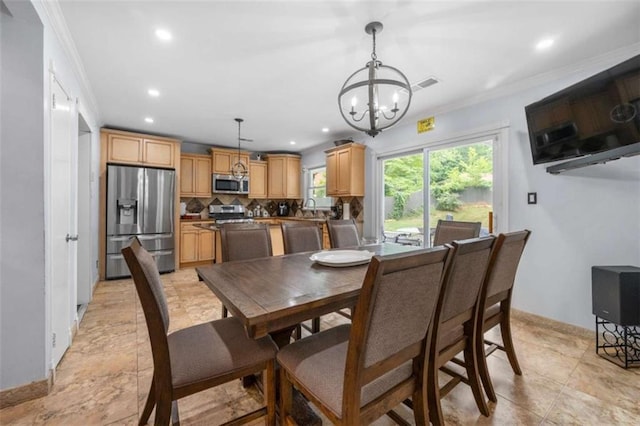 2021 Sherwood Dr SE, Marietta, GA 30062 - dining area featuring a chandelier, recessed lighting, ornamental molding, and baseboards