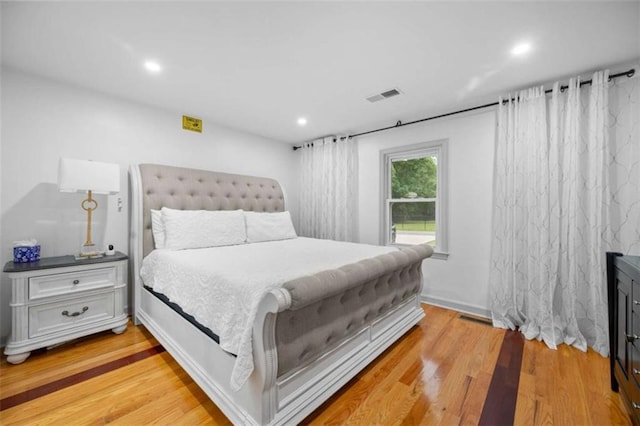 2021 Sherwood Dr SE, Marietta, GA 30062 - bedroom featuring light wood-style floors and recessed lighting