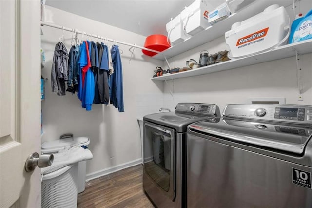 2021 Sherwood Dr SE, Marietta, GA 30062 - laundry room with separate washer and dryer, dark wood-style floors, and baseboards