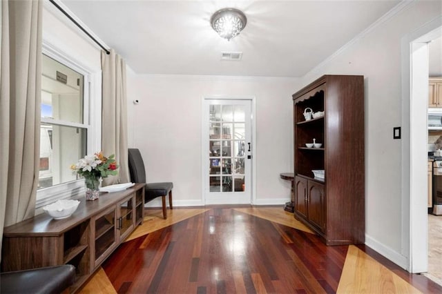 2021 Sherwood Dr SE, Marietta, GA 30062 - entrance foyer with wood finished floors, baseboards, and ornamental molding