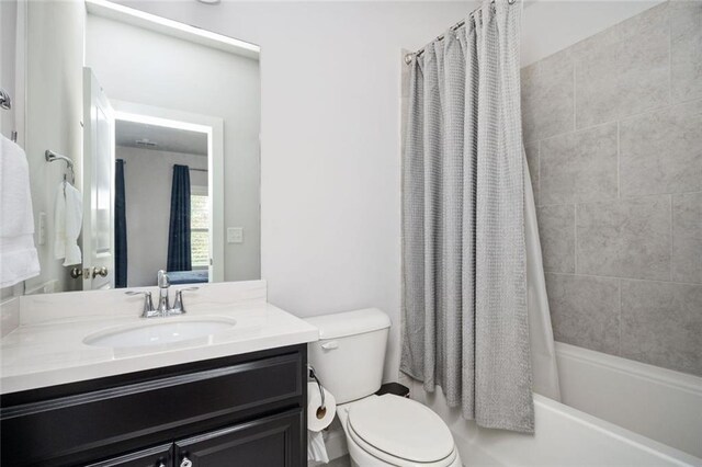 2026 Forte Ln, Alpharetta, GA 30009 - full bathroom with vanity, toilet, and shower / bath combo with shower curtain