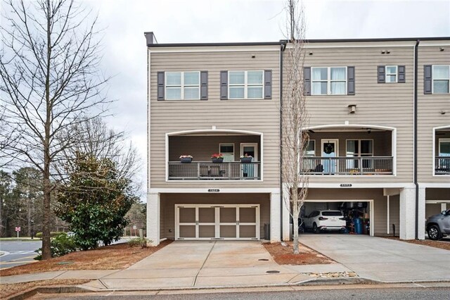 2026 Forte Ln, Alpharetta, GA 30009 - view of front of house featuring a garage and driveway