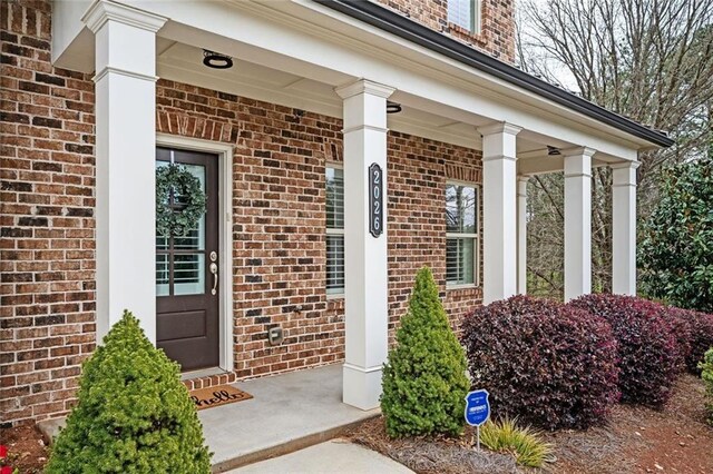 2026 Forte Ln, Alpharetta, GA 30009 - property entrance featuring brick siding and covered porch