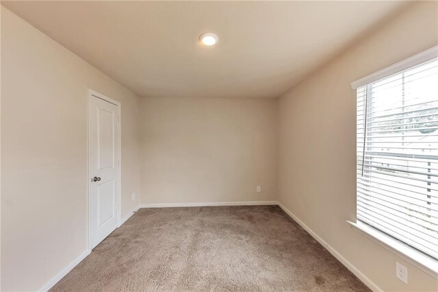 513 Moline Way, Locust Grove, GA 30248 - unfurnished bedroom featuring attic access, carpet floors, baseboards, and a closet
