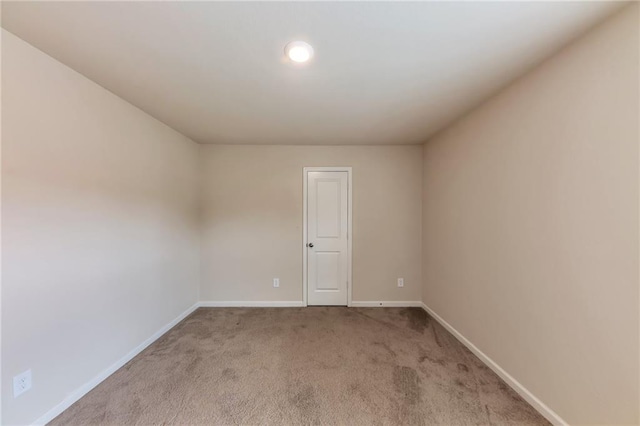513 Moline Way, Locust Grove, GA 30248 - spare room with light carpet and baseboards