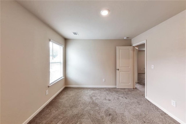 513 Moline Way, Locust Grove, GA 30248 - spare room featuring carpet floors and baseboards