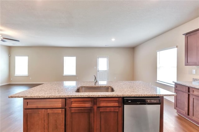 513 Moline Way, Locust Grove, GA 30248 - kitchen featuring stainless steel dishwasher, a sink, wood finished floors, plenty of natural light, and recessed lighting