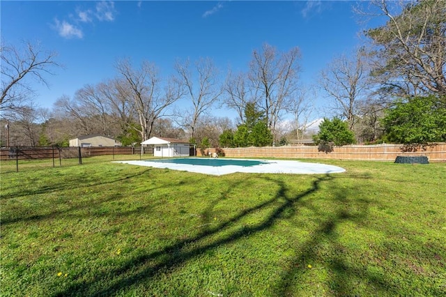 view of yard featuring a fenced backyard and a fenced in pool