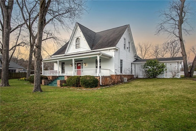 view of front facade with a porch and a front yard