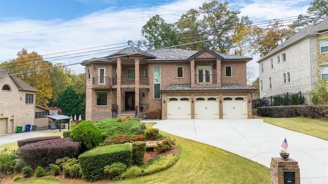 view of front facade featuring a balcony, a garage, brick siding, driveway, and a front lawn