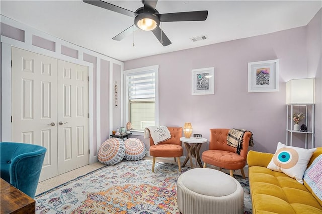 interior space featuring ceiling fan