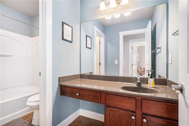 full bathroom featuring shower / bathtub combination, tile patterned floors, vanity, and toilet