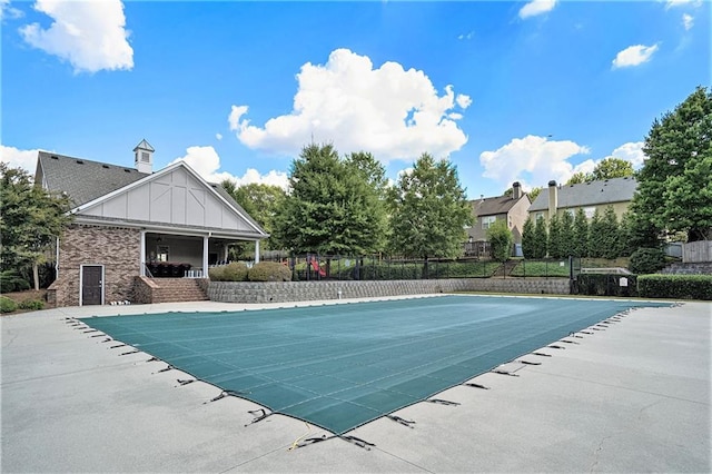 view of swimming pool featuring a patio