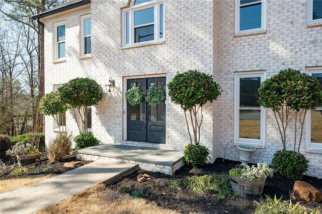 entrance to property featuring french doors